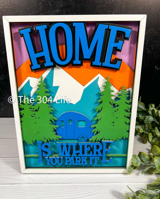 "Home Is Where You Park it" sign.